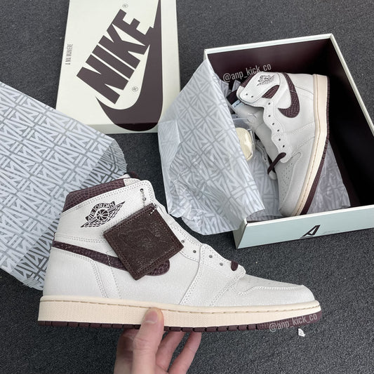A Ma Mani?e x Air Jordan 1 High OG Sail and Burgundy DO7097-100